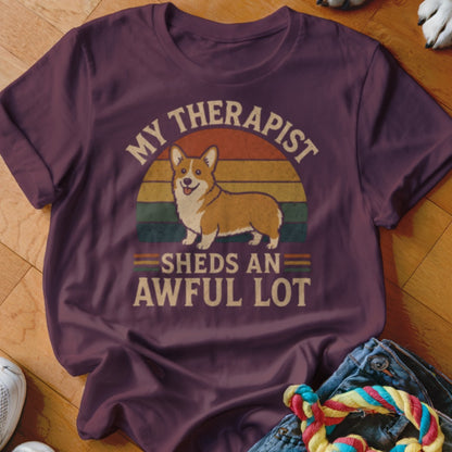 Maroon t-shirt with a Corgi graphic and text "My Therapist Sheds An Awful Lot".