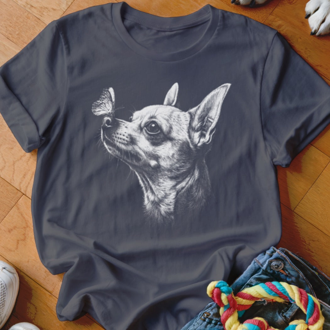Dark gray t-shirt featuring a white sketch of a chihuahua with a butterfly on its nose.
