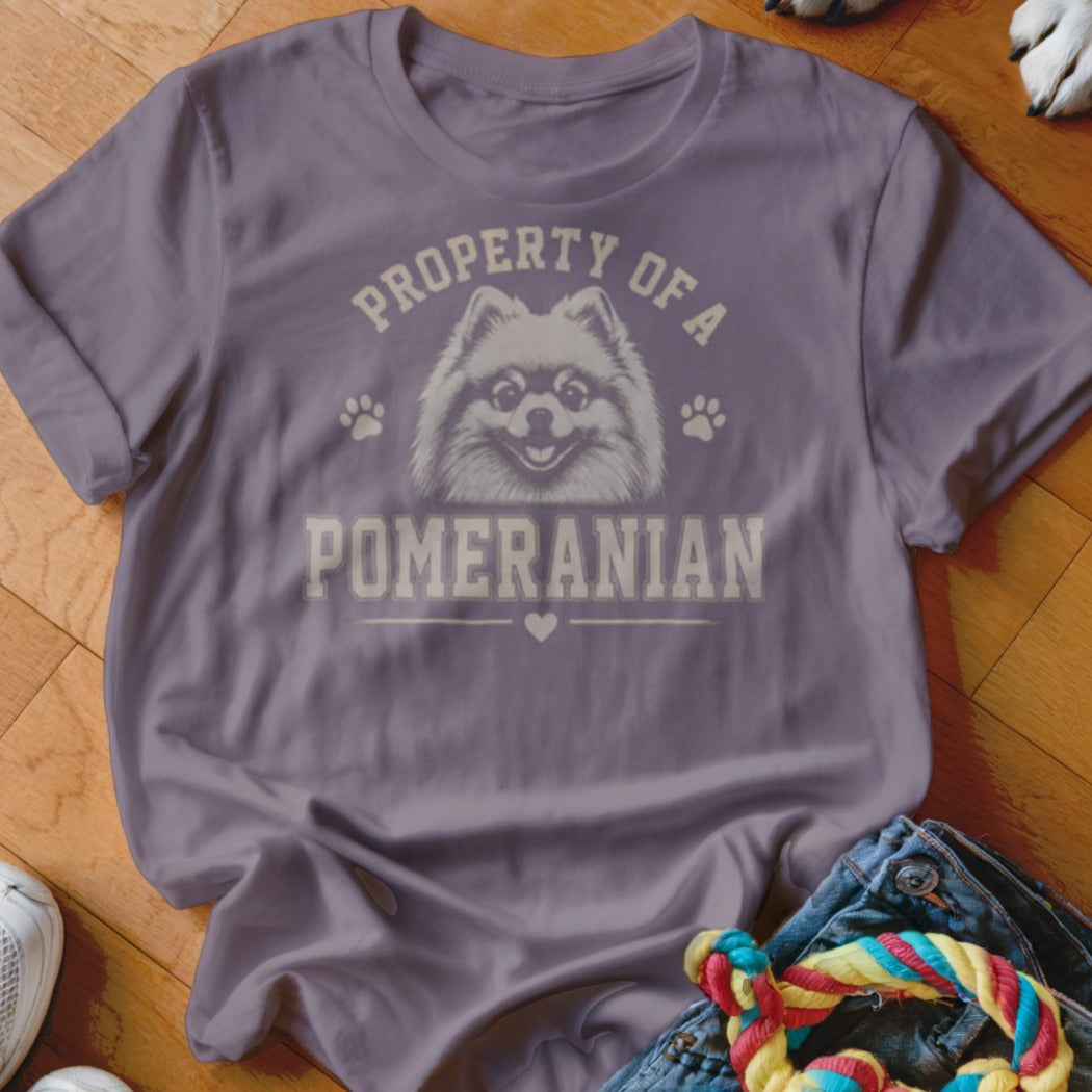 Purple t-shirt with "Property of a Pomeranian" text and a dog graphic.