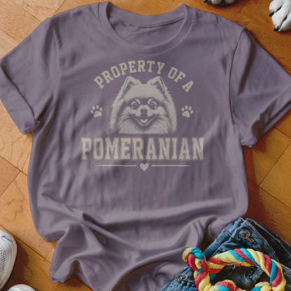 Purple t-shirt with "Property of a Pomeranian" text and a dog graphic.