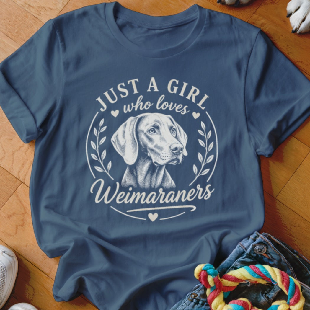 Dark blue t-shirt with "Just a girl who loves Weimaraners" and a dog graphic.