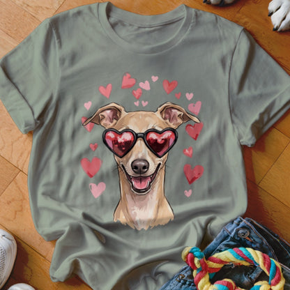 Sage green crewneck t-shirt featuring an illustration of a smiling dog wearing heart-shaped sunglasses, surrounded by pink hearts.