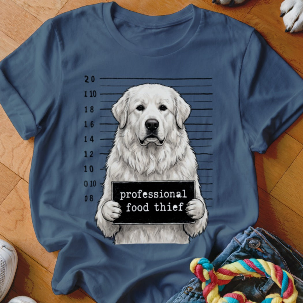 White dog mugshot with "professional food thief" sign.