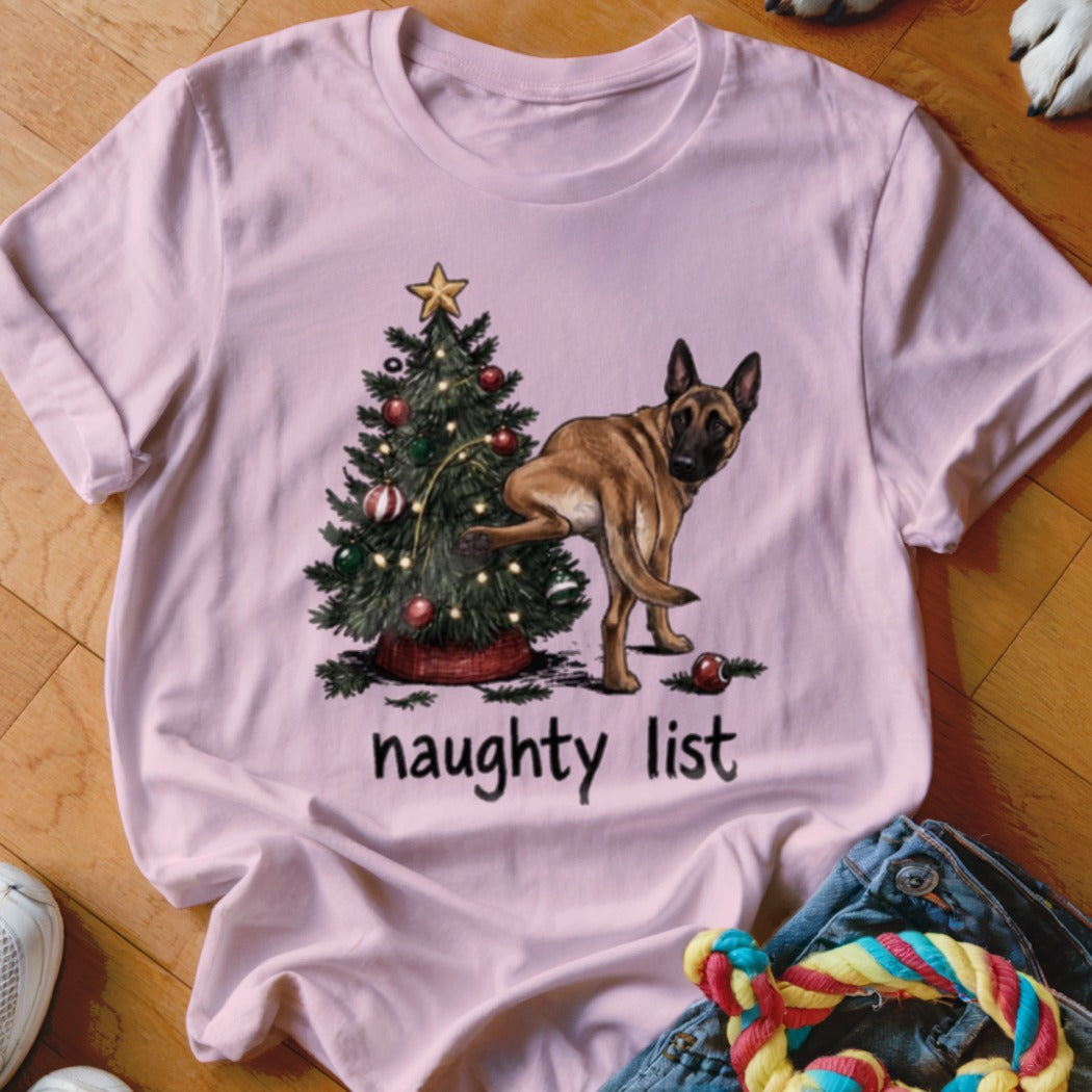 Dog lifting leg on Christmas tree with text "naughty list".