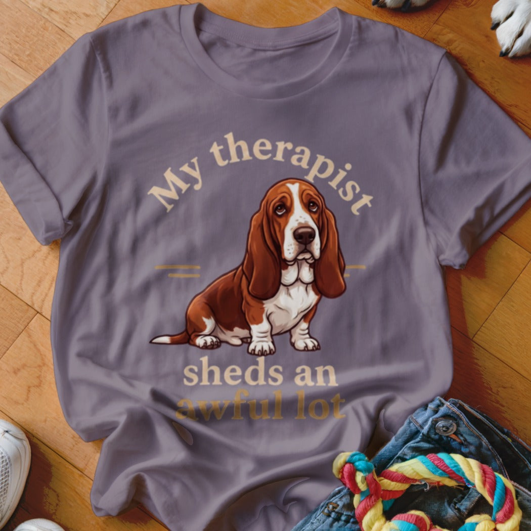 Basset Hound on a shirt with text "My therapist sheds an awful lot."