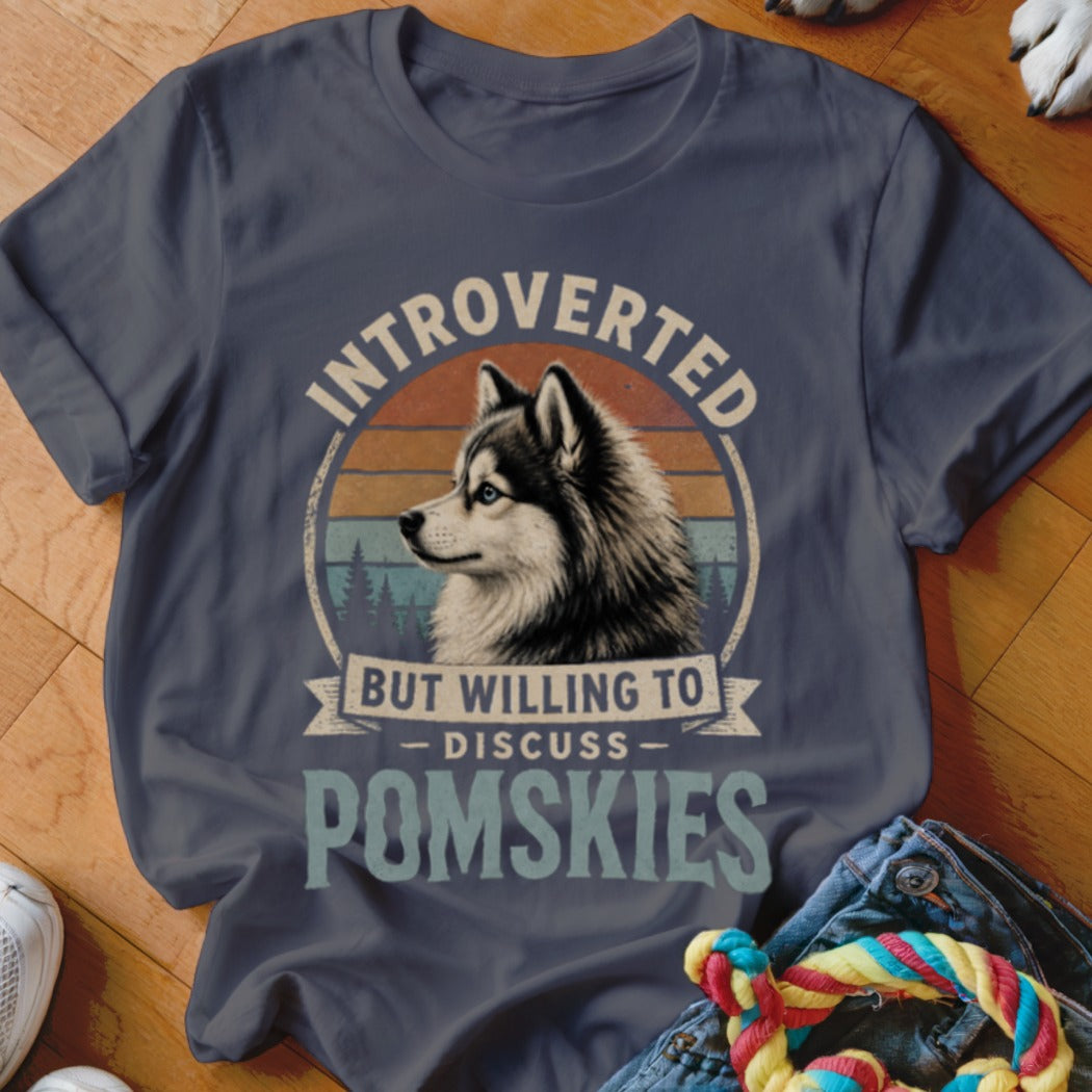 Dark blue t-shirt with husky graphic and text: "Introverted but willing to discuss Pomskies."