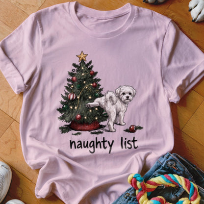 Pink t-shirt with a white dog and Christmas tree design and "naughty list" text.