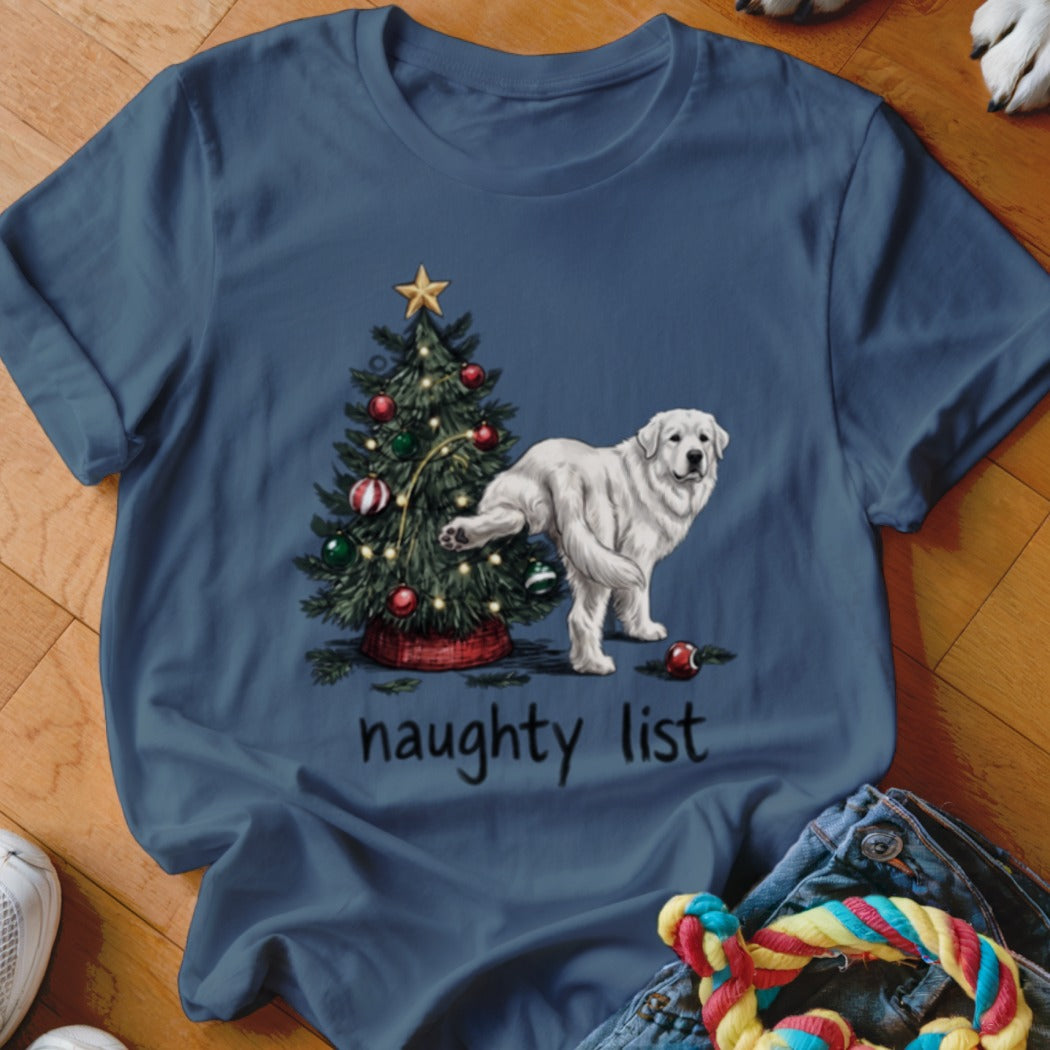 White dog near Christmas tree with "naughty list" text.