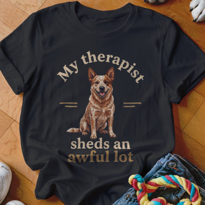 Black t-shirt with a red heeler dog and text: "My therapist sheds an awful lot".