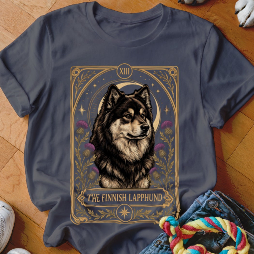 Dark gray t-shirt featuring a tarot card graphic of a Finnish Lapphund surrounded by thistles and a crescent moon.
