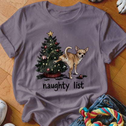 Chihuahua near Christmas tree with text "naughty list".