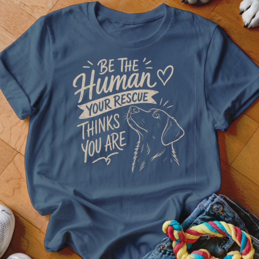 T-shirt with "Be the human your rescue thinks you are" text and dog outline.