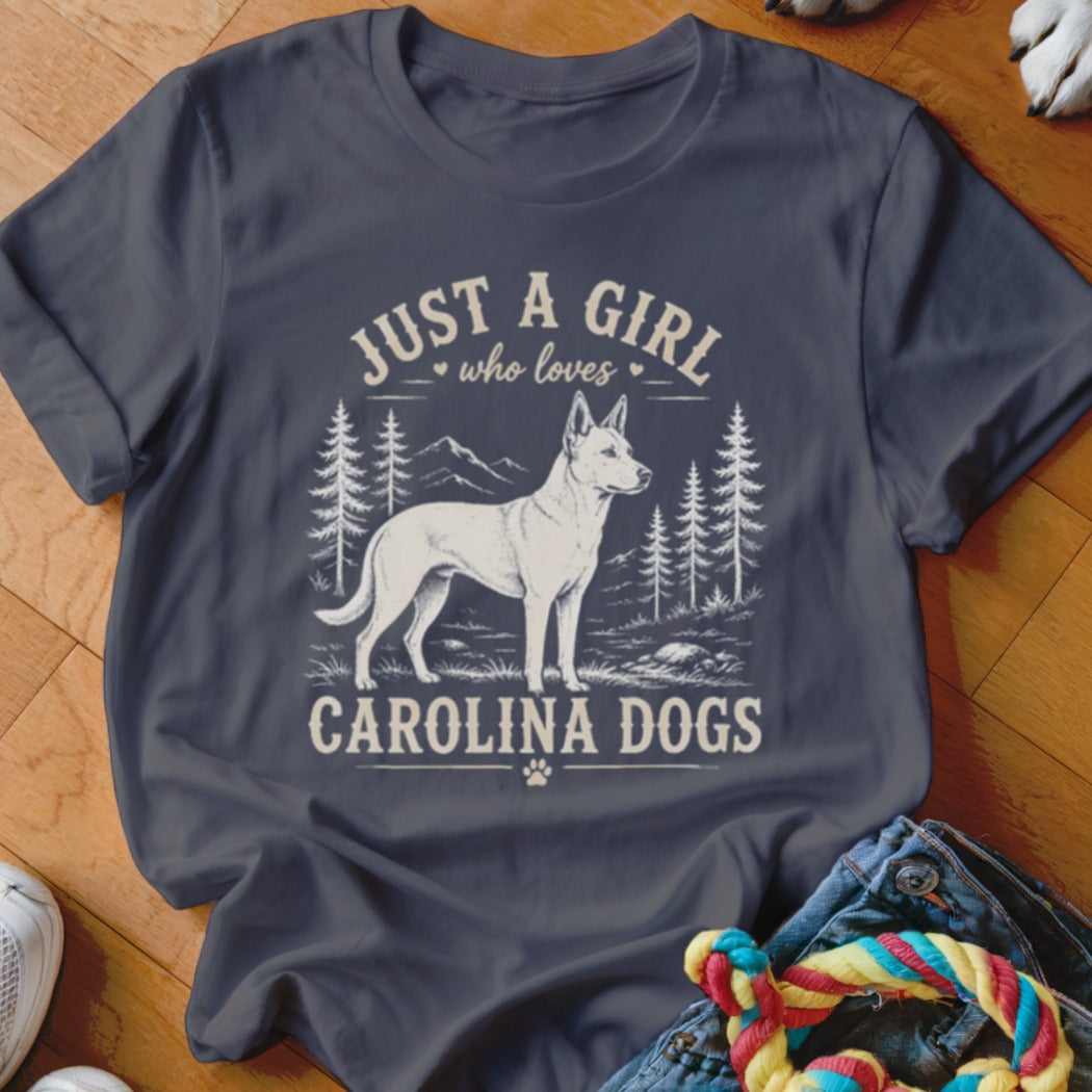 T-shirt graphic with white Carolina dog, trees, mountains, and text.