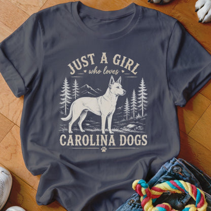 T-shirt graphic with white Carolina dog, trees, mountains, and text.