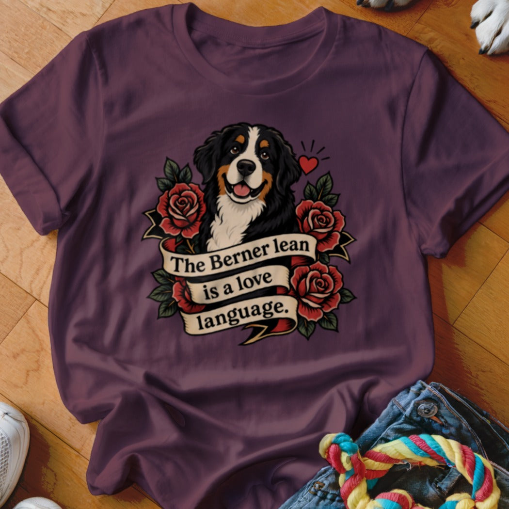 Bernese Mountain Dog with roses and text: The Berner lean is a love language.