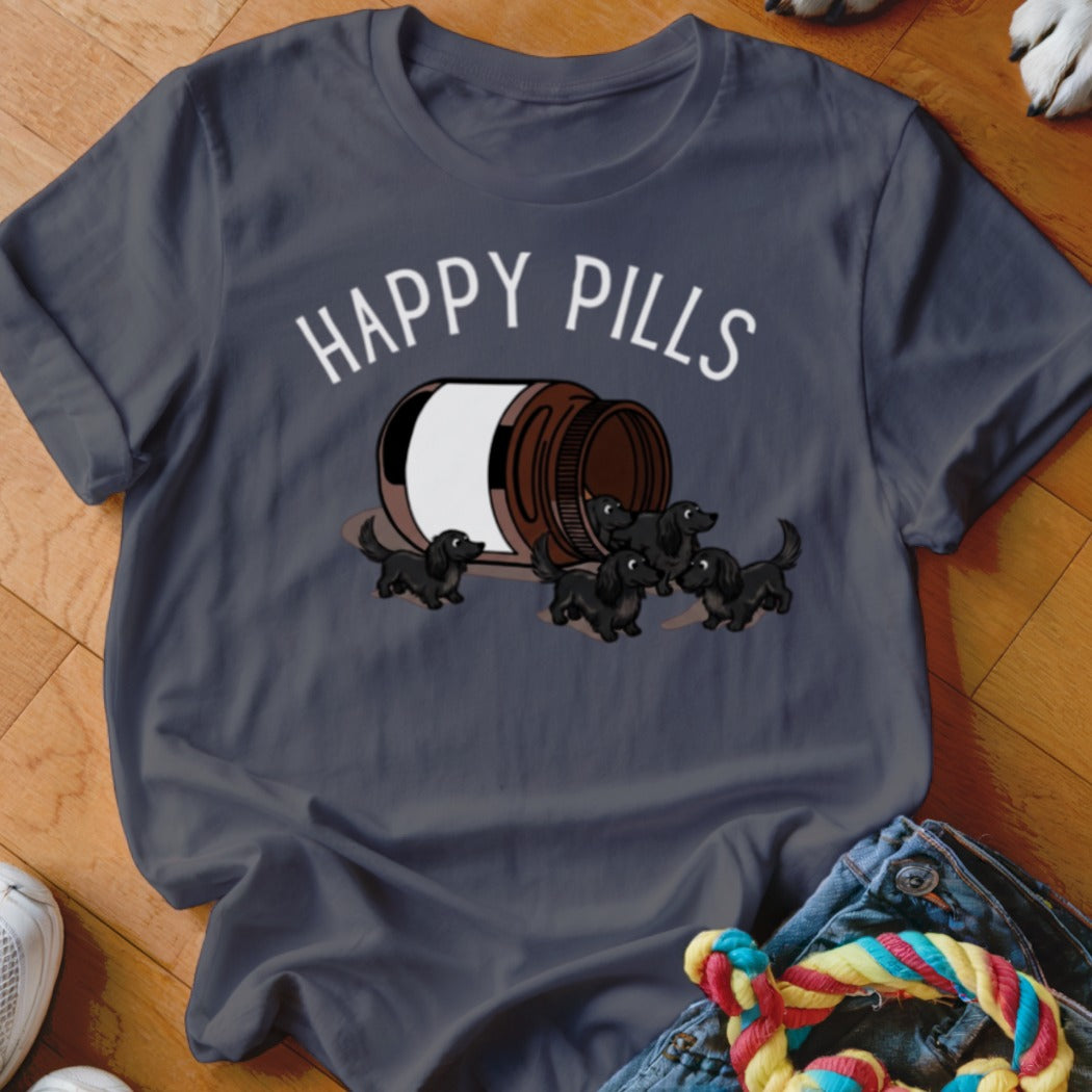 Graphic of black dachshund puppies spilling from a medicine bottle with the text "HAPPY PILLS".