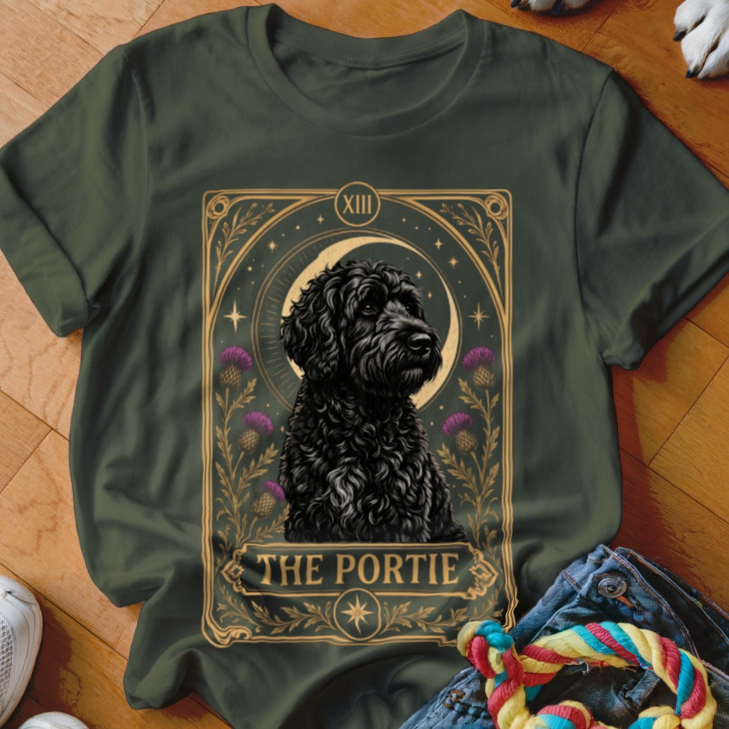 Dark green crewneck t-shirt featuring a tarot card style graphic of a black dog with text reading The Portie.