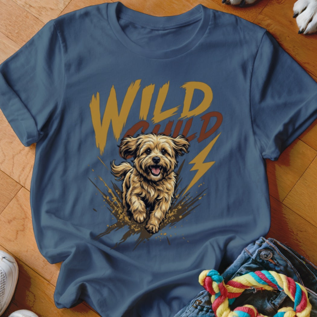 Blue t-shirt featuring a graphic of a happy, fluffy dog and the text Wild Child.