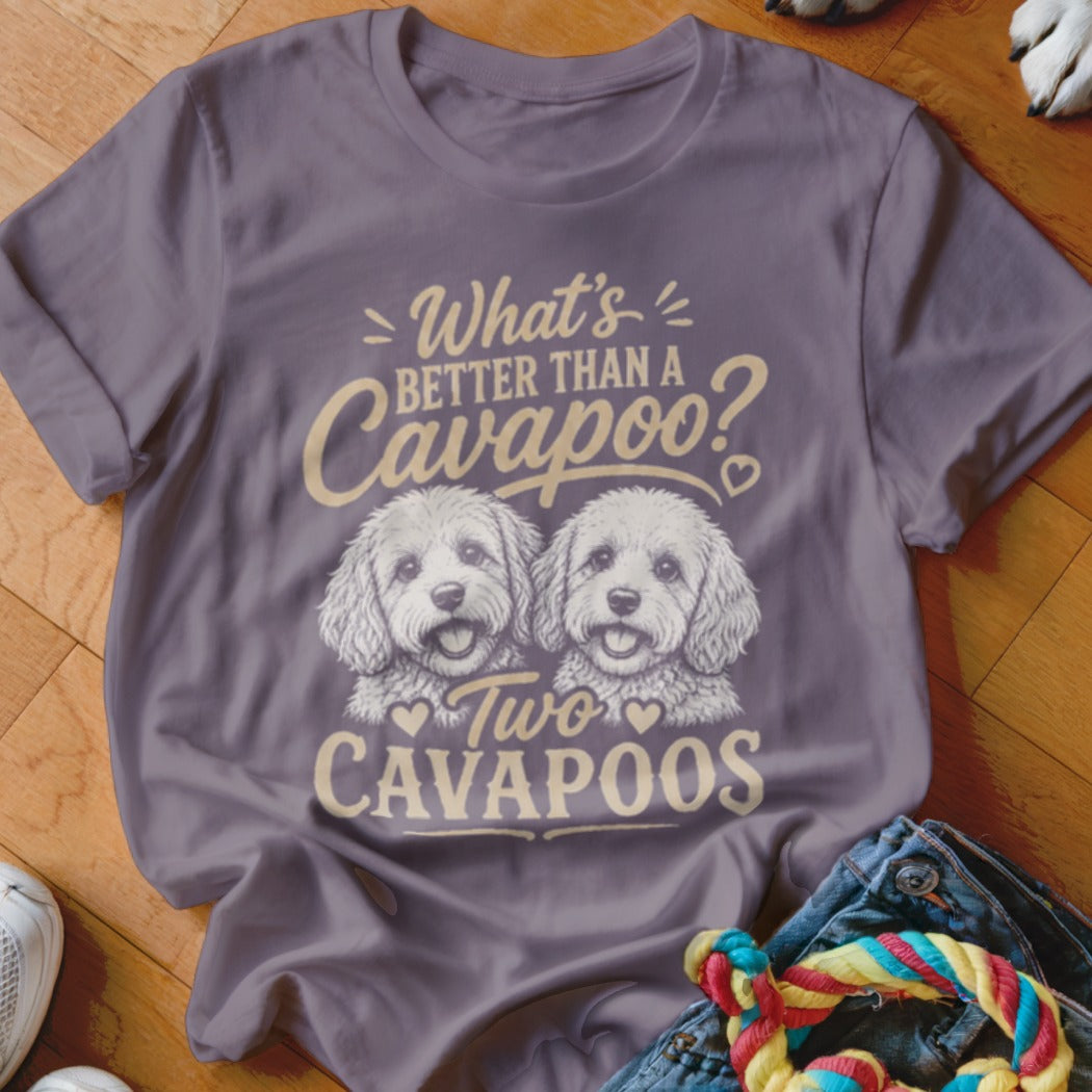 Purple t-shirt with "What's better than a Cavapoo? Two Cavapoos" and two dog illustrations.