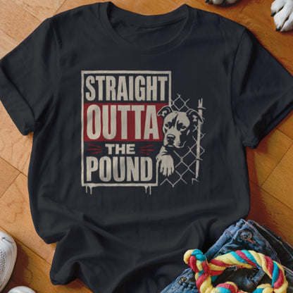Dark t-shirt with "STRAIGHT OUTTA THE POUND" text and a dog behind a fence.