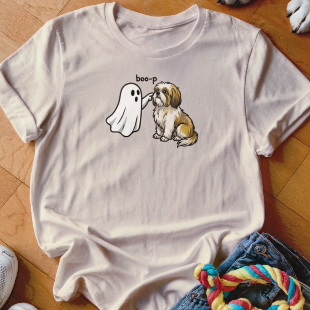 Illustration of ghost boo-ping a shihtzu dog with text "boo-p" on light cream t-shirt.