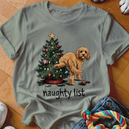 Light gray t-shirt with a Christmas tree, a dog, and the text "naughty list".