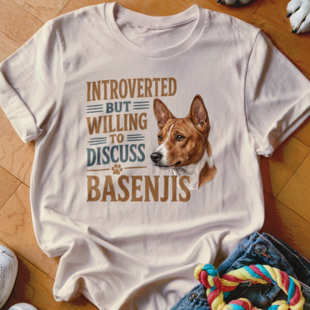 White t-shirt with "Introverted But Willing To Discuss Basenjis" text and dog portrait.