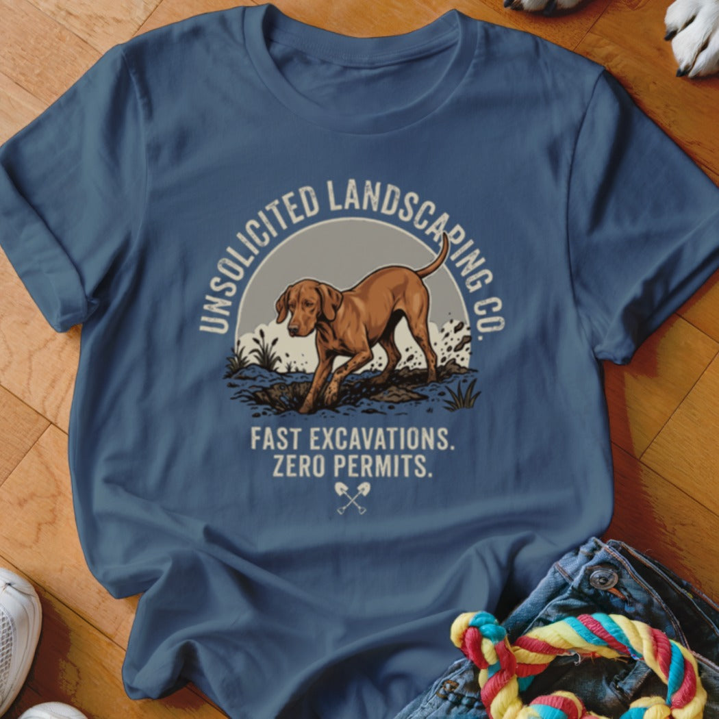 T-shirt graphic: dog digging dirt, text "Unsolicited Landscaping Co."