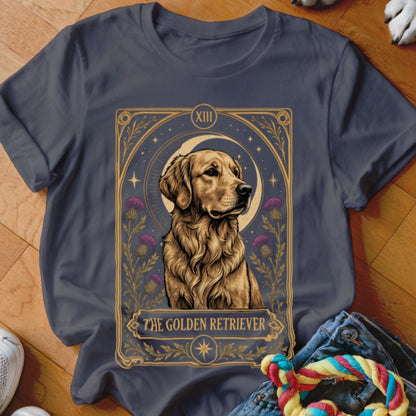 Dark grey t-shirt featuring a tarot card graphic of a golden retriever with purple thistle flowers.