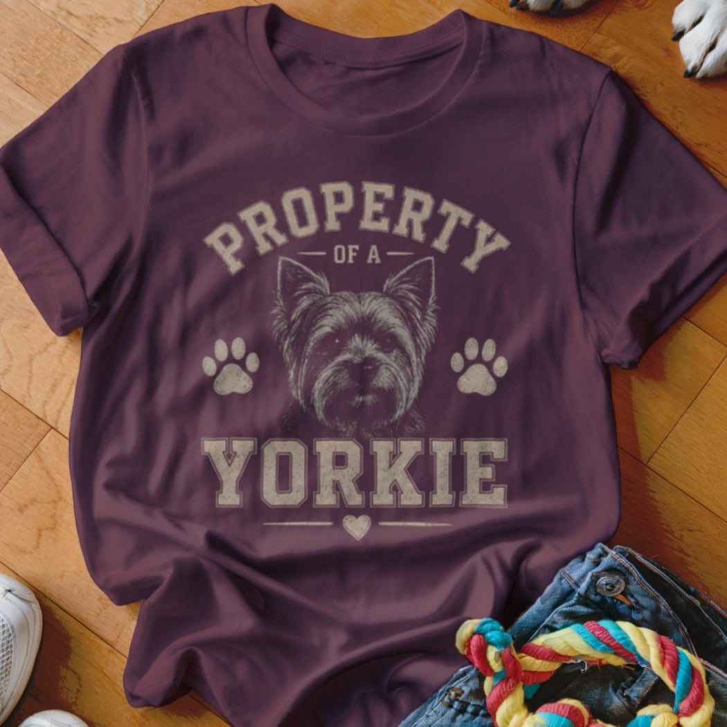 Maroon t-shirt with "Property of a Yorkie" text and a dog illustration.