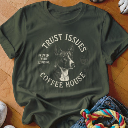 Green t-shirt with "Trust Issues Coffee House Brewed With Suspicion" and dog graphic.