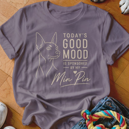 Purple t-shirt with a line drawing of a dog and text "Today's Good Mood Is Sponsored By My Min Pin".