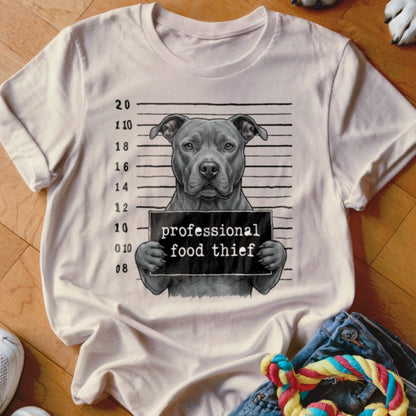 Pit bull dog mugshot graphic with "professional food thief" sign on a t-shirt.