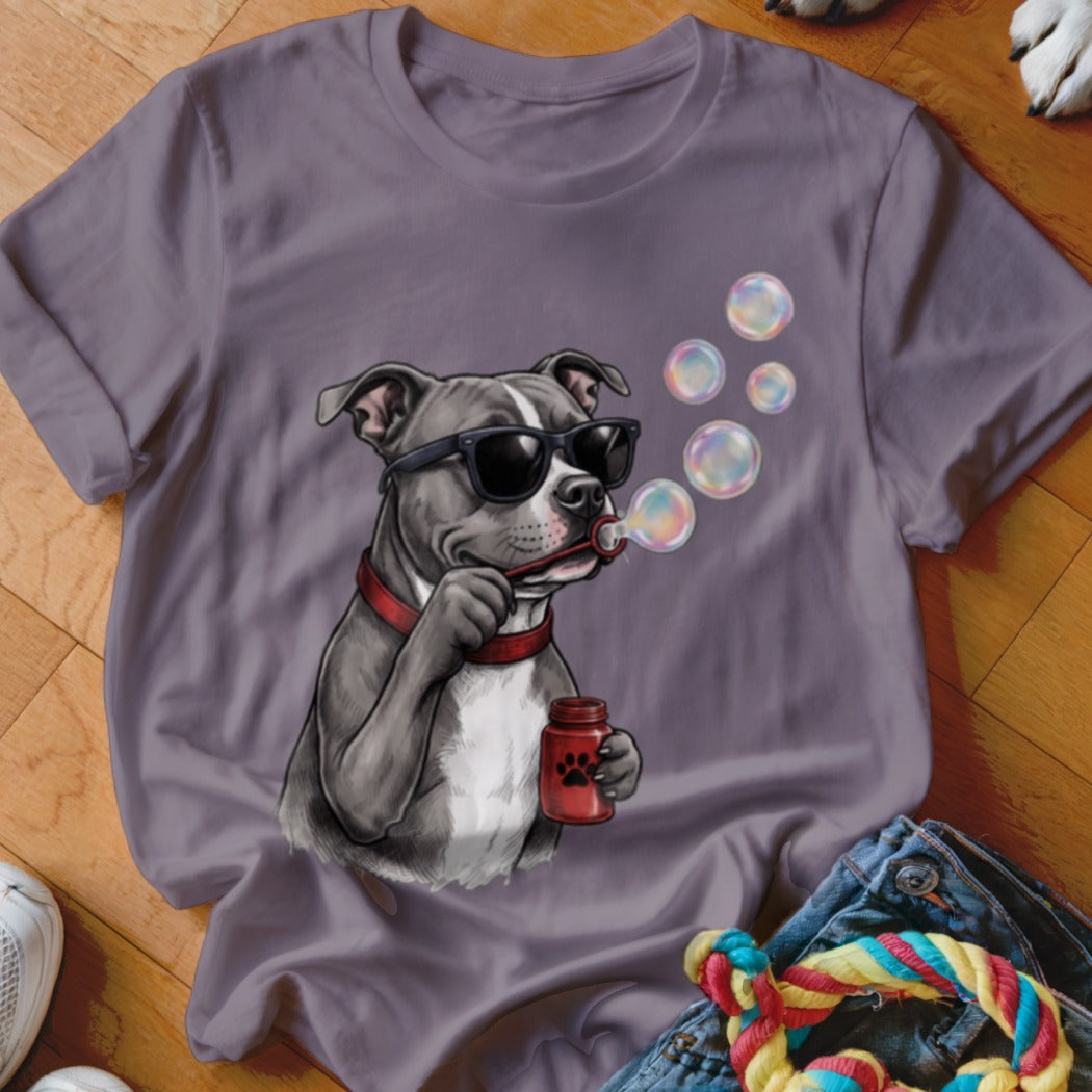 Gray t-shirt featuring an illustration of a pit bull wearing sunglasses and blowing soap bubbles.