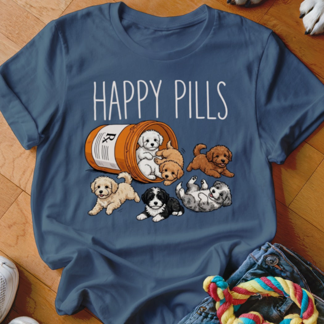 T-shirt graphic with "HAPPY PILLS" text above a prescription bottle filled with puppies.