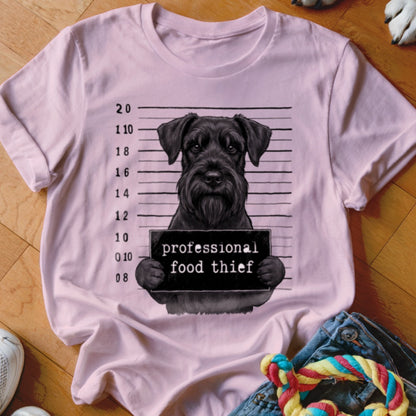Pink t-shirt with a black schnauzer mugshot holding a sign that says "professional food thief".