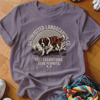 T-shirt graphic of a St. Bernard dog digging with text "UNSOLICITED LANDSCAPING CO."