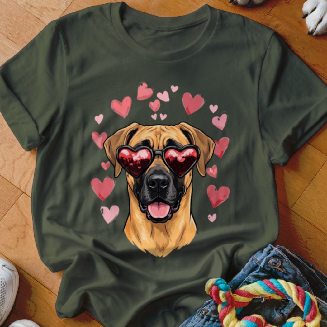 Dark green t-shirt featuring a graphic of a dog wearing heart-shaped sunglasses, surrounded by pink hearts.