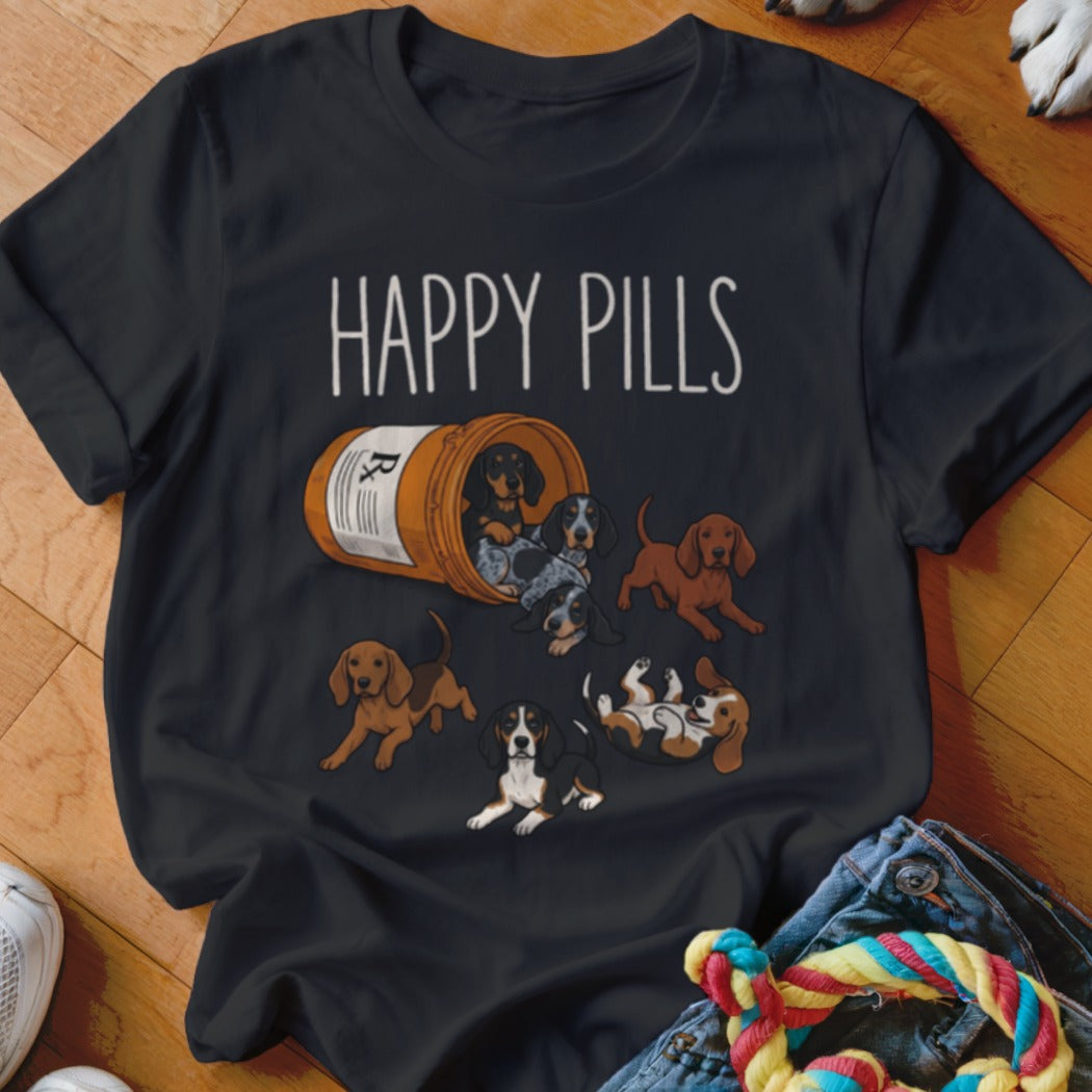 Black t-shirt with "HAPPY PILLS" text and cartoon puppies spilling from a pill bottle.