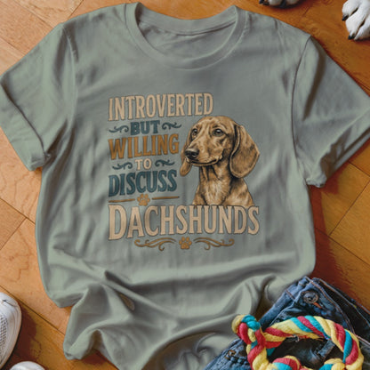 T-shirt with a dachshund and text "Introverted but willing to discuss Dachshunds".