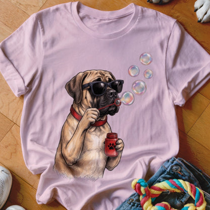 Light pink t-shirt featuring an illustration of a mastiff wearing sunglasses and blowing soap bubbles.