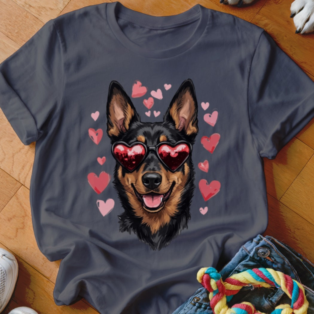 A charcoal gray t-shirt featuring a graphic of a black dog wearing heart-shaped sunglasses, surrounded by pink hearts.