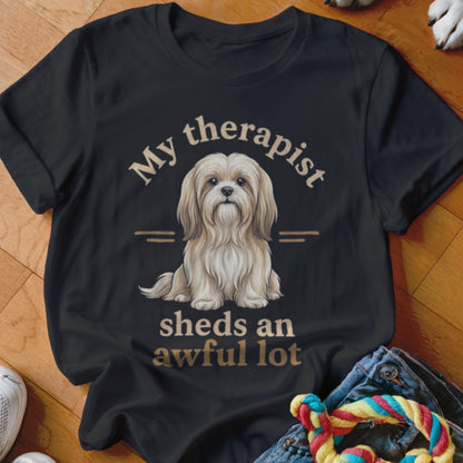 Black t-shirt with dog illustration and text "My therapist sheds an awful lot".