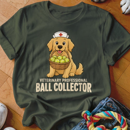 Dark green t-shirt with a graphic of a golden retriever wearing a nurse cap and holding a basket of tennis balls, accompanied by the text "VETERINARY PROFESSIONAL BALL COLLECTOR".