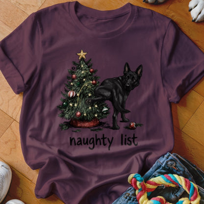 Black German Shepherd near Christmas tree with ornaments and "naughty list" text.