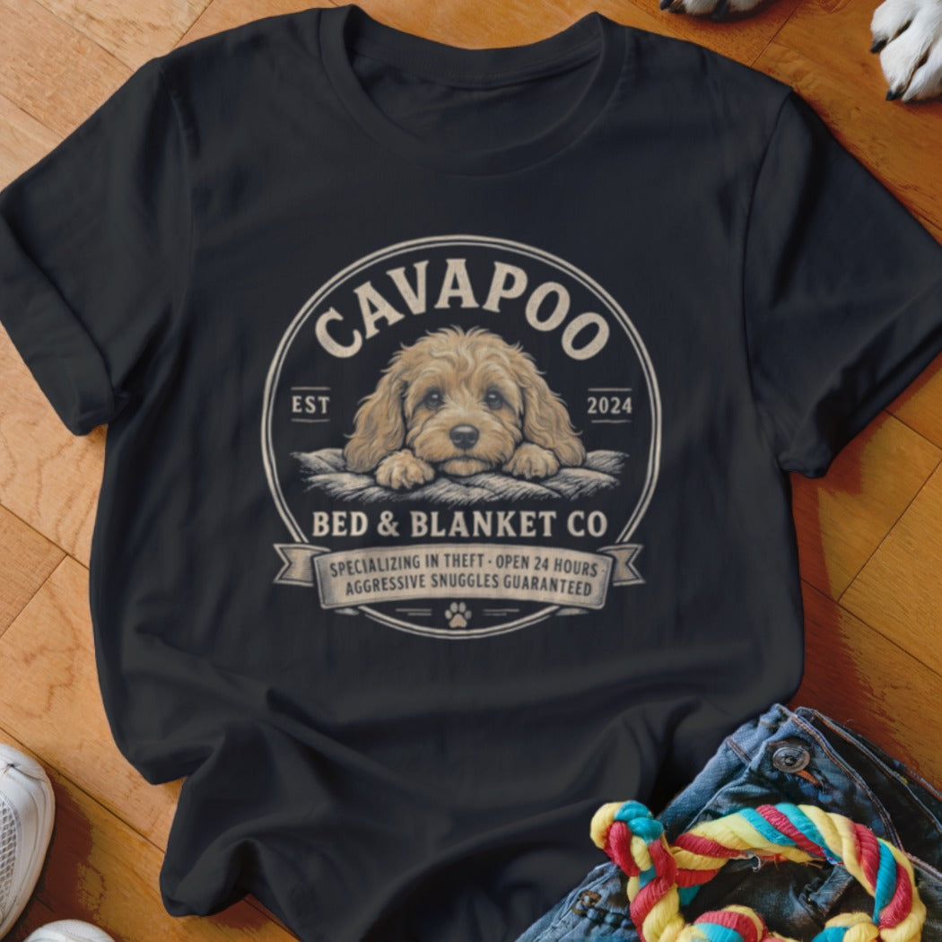 Cavapoo Bed & Blanket Co. graphic on a black t-shirt with dog and text.