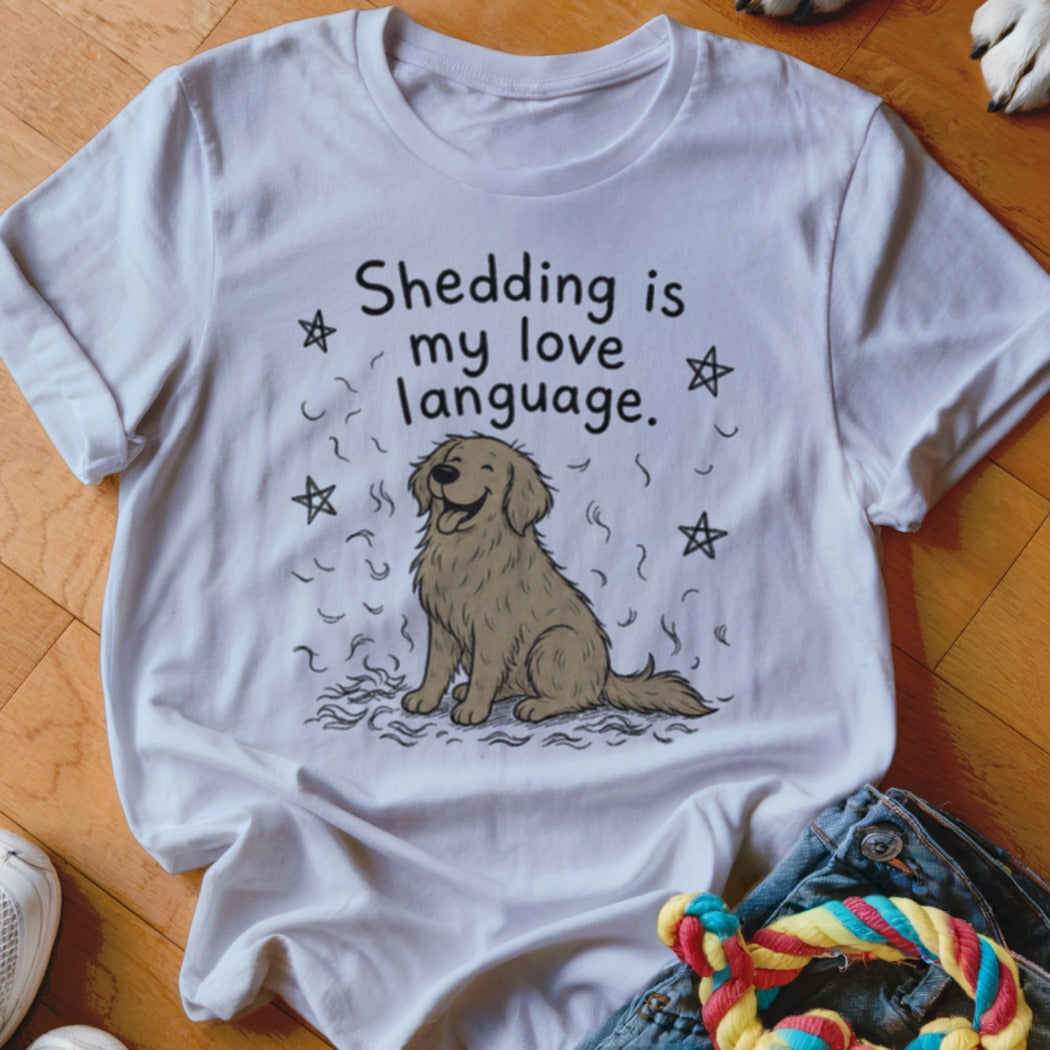 White t-shirt with cartoon Golden Retriever and text "Shedding is my love language."