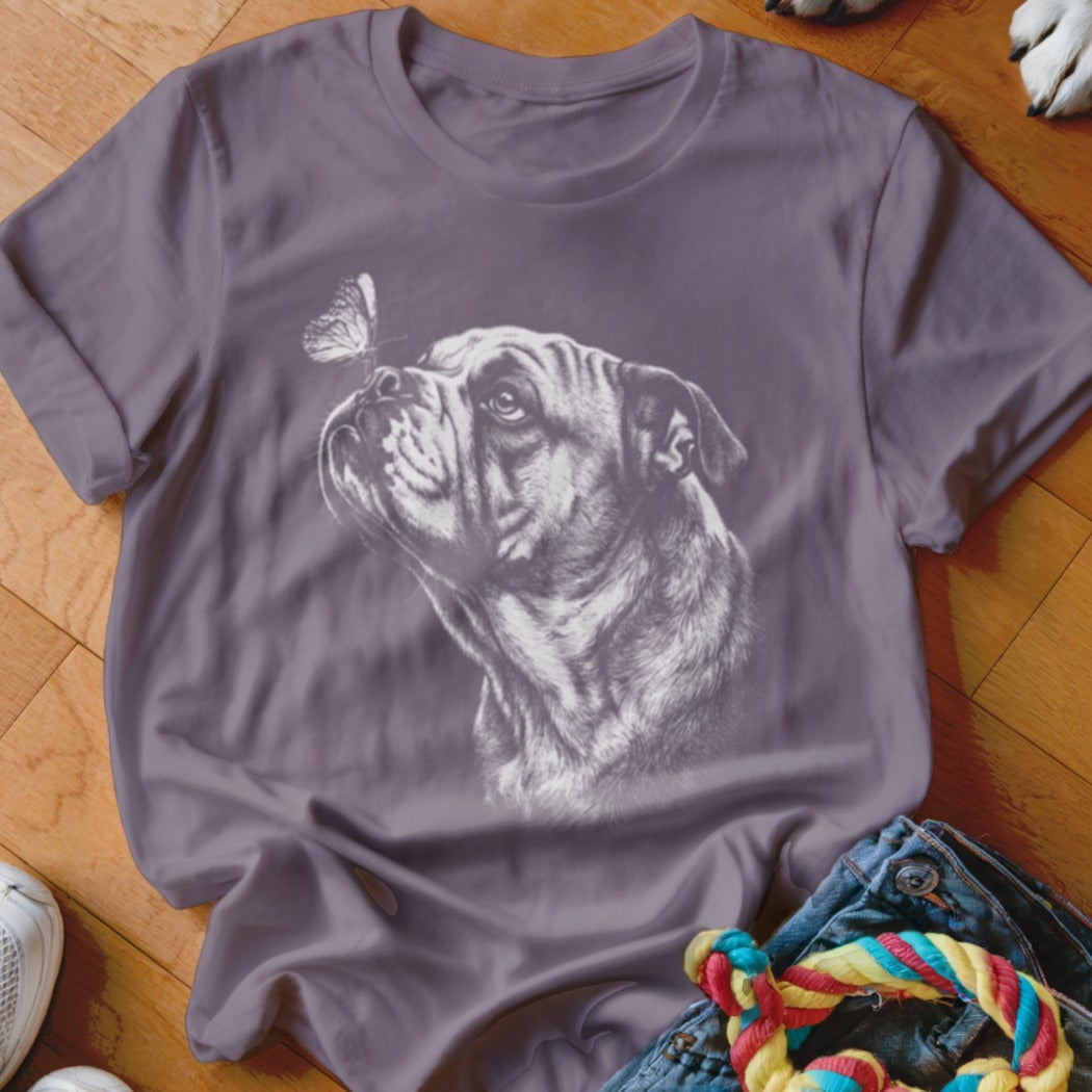 Grey crewneck t-shirt featuring a white sketch graphic of a bulldog looking at a butterfly.