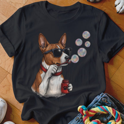 Black t-shirt featuring an illustration of a brown and white dog wearing sunglasses and blowing soap bubbles.