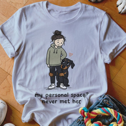 White t-shirt with a cartoon of a girl and a dog, reads "my personal space? never met her."